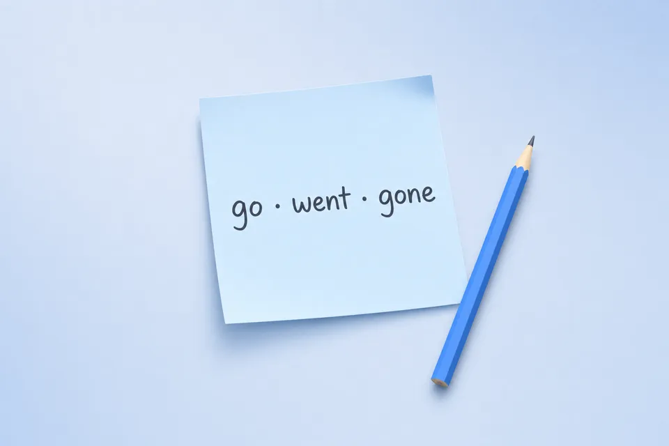 A pale blue sticky note reading go · went · gone, with a blue pencil